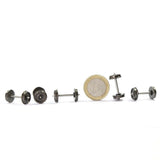 Set of miniature black metal dumbbell-shaped earrings with realistic weight plate details and metallic finish for metal train wheels