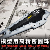 Black and white scale modeling plane with yellow accents for paint mixing