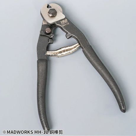 Black-handled copper rod cutter with silver head and Map MH-12 engraving