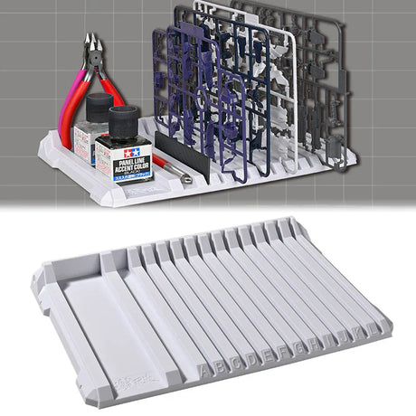 Gray plastic multifunctional sprue holder tray with labeled parts slots