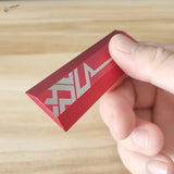Red beveled edge sanding plates keychain with silver geometric logo
