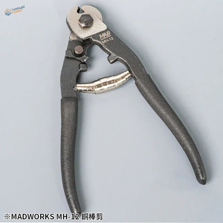 Black-handled copper rod cutter with silver head and Map MH-12 engraving