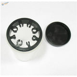 Black plastic lid with cutouts on brush cleaning bottle base