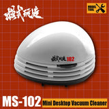 White plastic dome mini desktop vacuum cleaner MS-102 with black base
