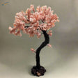 Delicate pink beaded scale model cherry blossom tree with dark twisted trunk