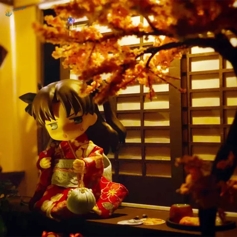 Chibi scale model cherry girl in red gold kimono with black hair holding pouch