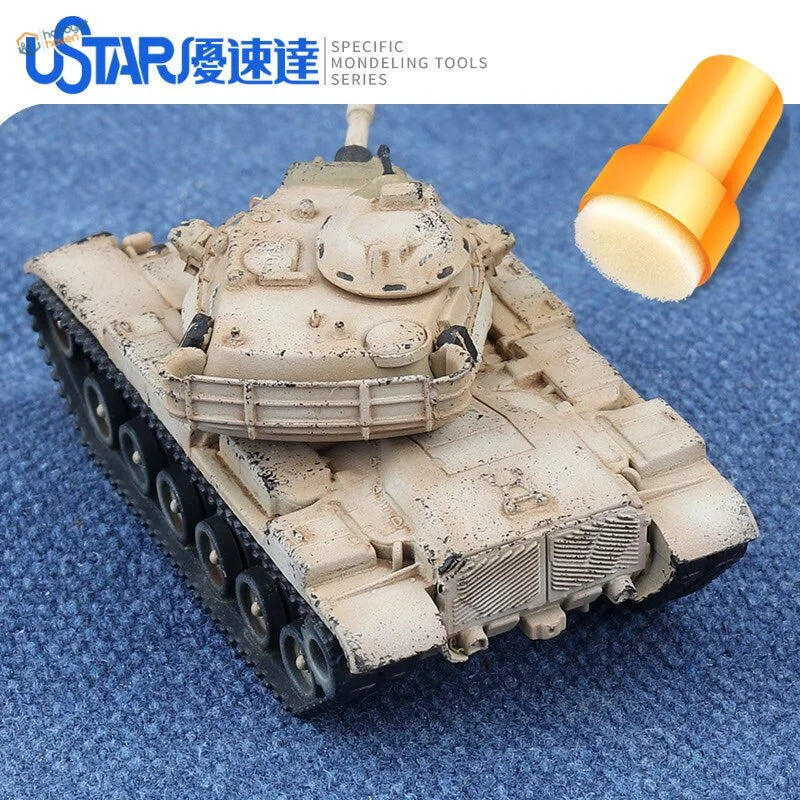 Beige and black tank model with sponge brush for scale modeling tools