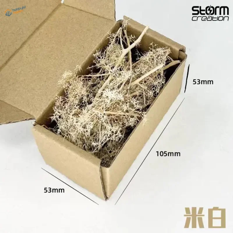 Light beige colorful shrubs for diorama in cardboard box