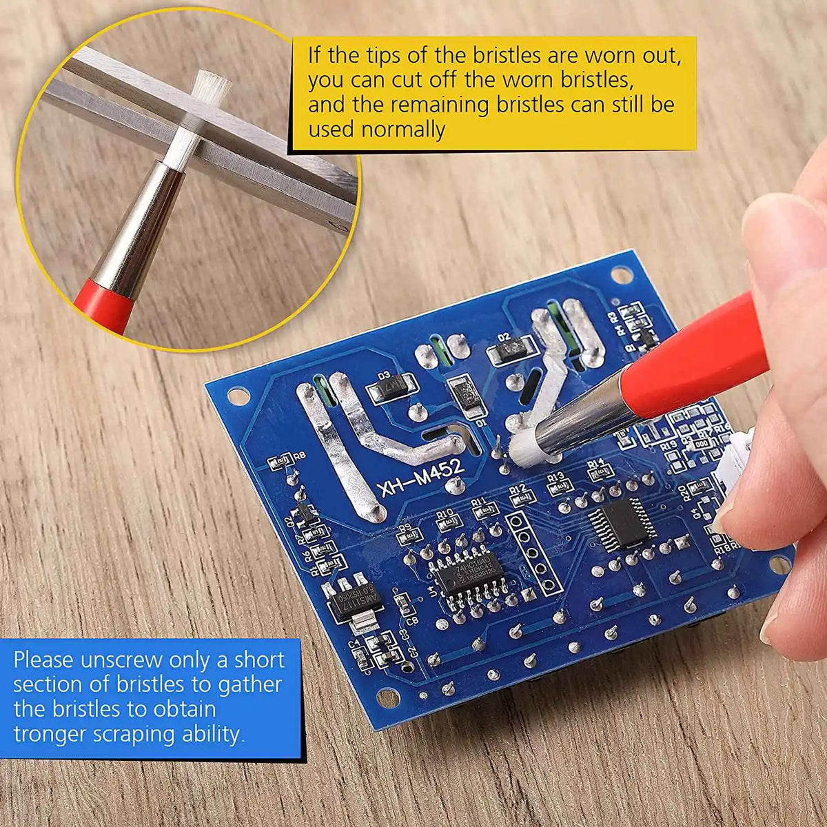 Red-handled brush pen with white bristles from a 4pcs brush pen set for delicate cleaning on blue circuit boards