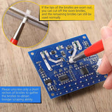 Red-handled brush pen with white bristles from a 4pcs brush pen set for delicate cleaning on blue circuit boards
