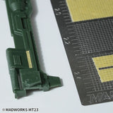Dark green MadWorks masking tape cutting template part with gold accent