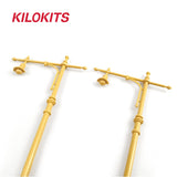 Two yellow plastic 1/35 scale street lamps with crossarms and bell-shaped light fixtures for model building tools