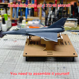 Gray 1 72 scale model airplane kit on adjustable wooden aircraft model painting stand for precision hobby tools