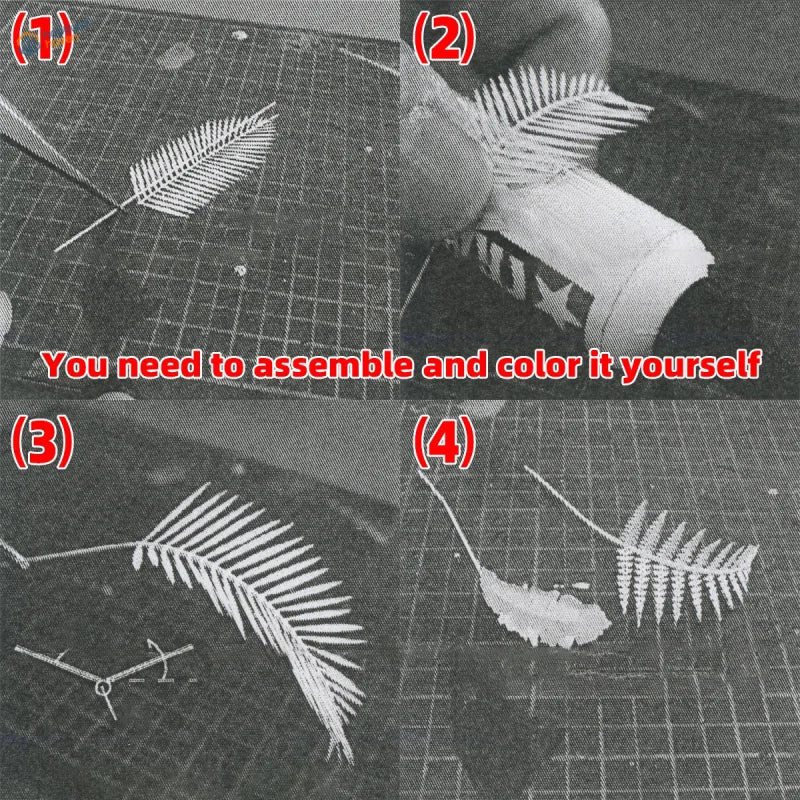 White paper cutout fern leaf craft pieces for diorama jungle plants used as precision hobby tools in scale modeling