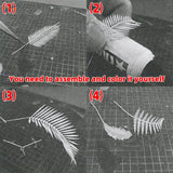 White paper cutout fern leaf craft pieces for diorama jungle plants used as precision hobby tools in scale modeling