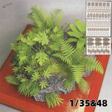 Diorama jungle plants with vibrant green artificial ferns on gray rock base for 1/35 and 48 scale model building tools