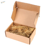 Open brown box of coconut fiber for dry shrubs in diorama creation