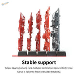 Dspiae sprue organizing tabs with red black model kit parts in rack