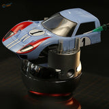 Light blue Ford GT40 die-cast model with red accents in DSPIAE light curing clear glue