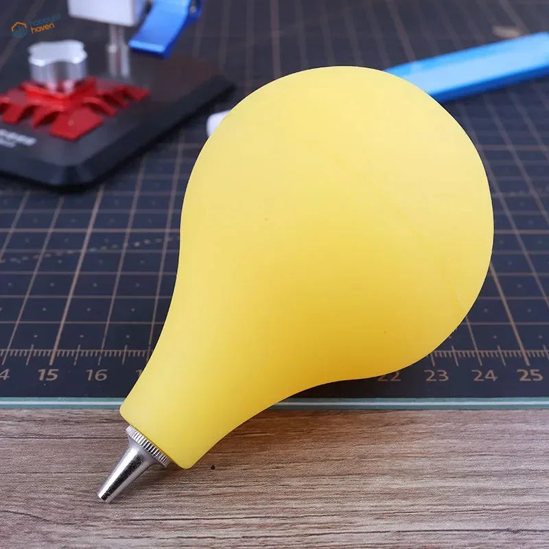 Yellow rubber bulb dust cleaning air ball with metallic nozzle