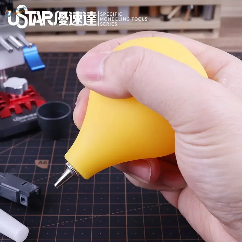Yellow ergonomic suction tool with metallic tip, ustar Dust Cleaning Air Ball