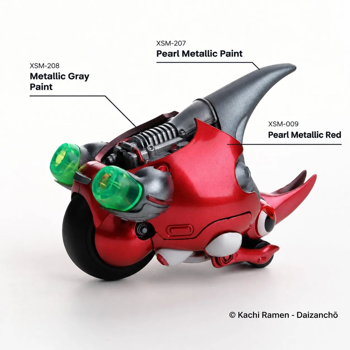Red and gray painted model motorcycle with the three XSM paint shades labeled