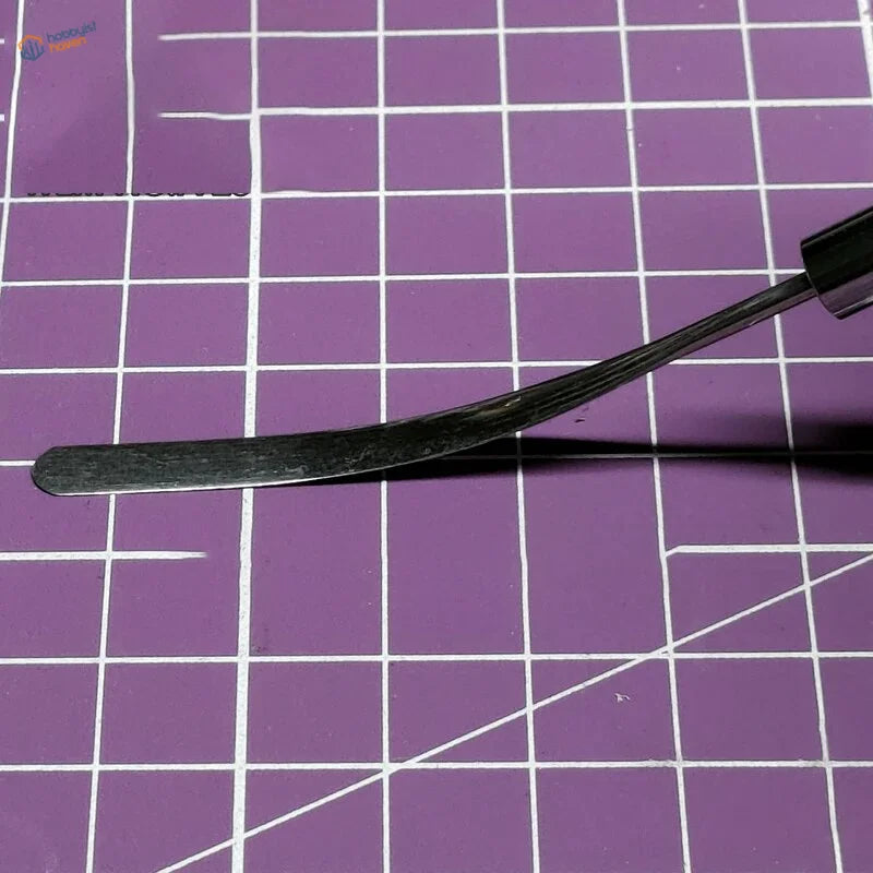 Black elastic spatula with curved polished tool and sturdy handle for scale modeling