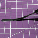 Black elastic spatula with curved polished tool and sturdy handle for scale modeling