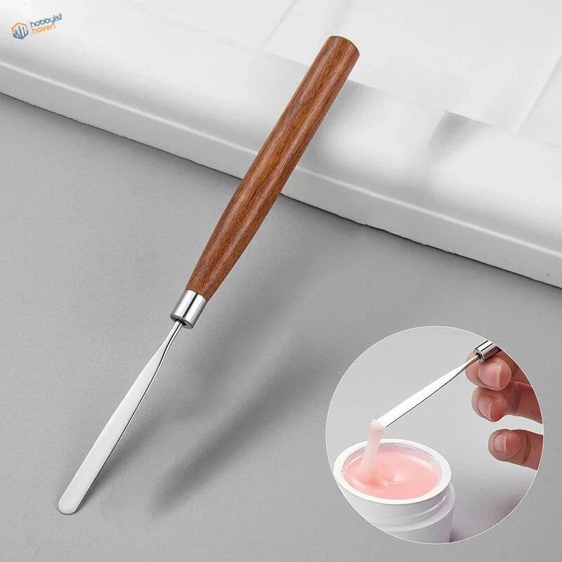 Elastic spatula with sleek stainless steel blade and polished wooden handle for scale modeling tools