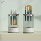 Electric brush cleaning machine with rose gold accents and white base