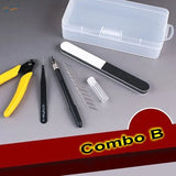 Essential tools set with precision pliers and scalpels in clear case