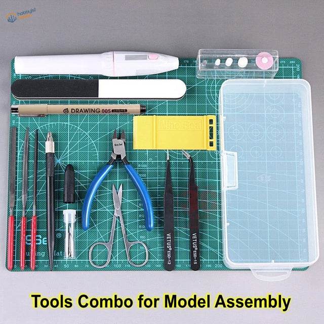 Blue-handled pliers in essential tools set for scale modelling