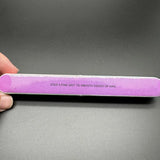 Purple fine grit 7-sided polishing rod with white edges and instructional text for scale modeling to remove mold lines