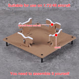 Adjustable brown cardboard aircraft model painting stand with white plastic airfoil supports for precision hobby tools