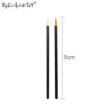 Two 9cm quality brushes with black handles, white and orange tips from 50 pcs disposable round brushes