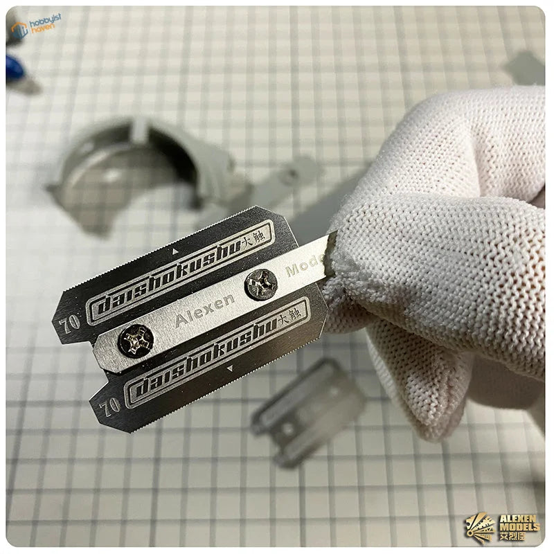 Silver metallic fine metal saw blade set for scale modeling with controlled cuts