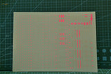 Fluorescent decals for HG/MG Gunplas: translucent beige sheet with pink grid markings