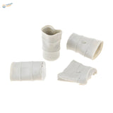 White resin drums with miniature bamboo planters and sanding stone