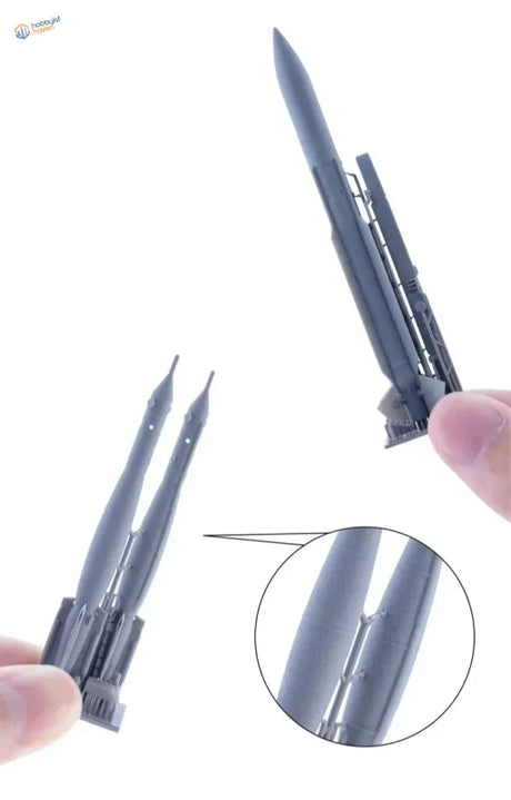 Gray plastic Galaxy Model rocket kit with aircraft weapons, 1/48 scale