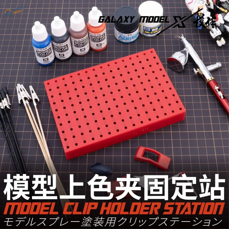 Galaxy Models clip holding base with red plastic grid of holes
