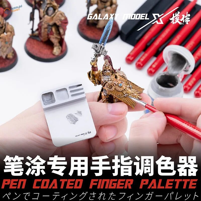 Gold Galaxy Tools Finger Palette miniature figurine with wings and blue sword