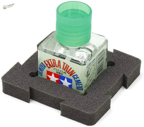 Tamiya glue bottle with anti-overturning sponge and green ribbed cap