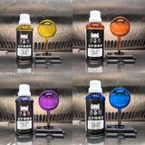 Burnt Metal set of four 50ml transparent model paints in yellow, orange, purple and deep blue for exhaust heat gradients
