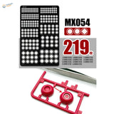 MX054 fret with 219 etched detail parts from 1.5 to 6 mm, beside a red Gunpla runner