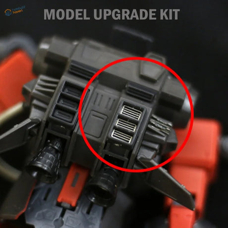 Black plastic Gundam metal etch plates with silver grilles, orange accents
