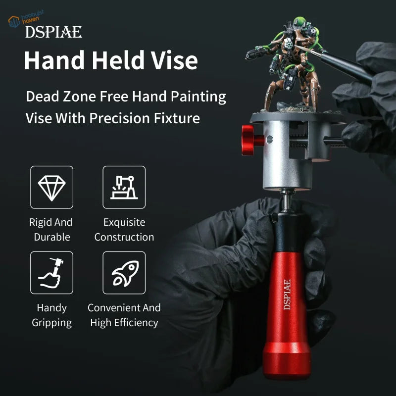 Red and silver hand held vise with precision fixture for miniature painting