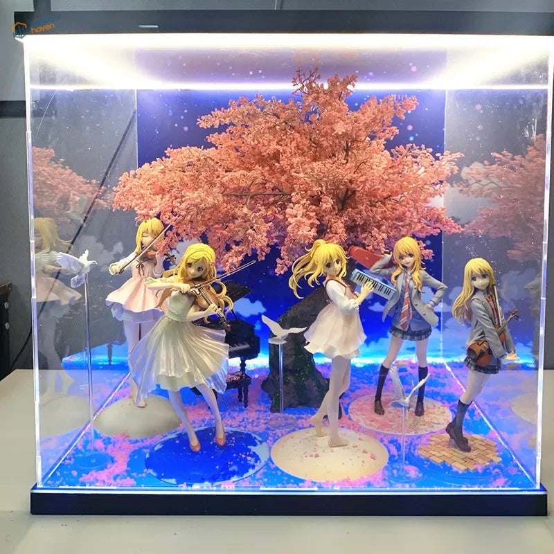 Handmade cherry tree display case with lit anime figurines and pink blossoms
