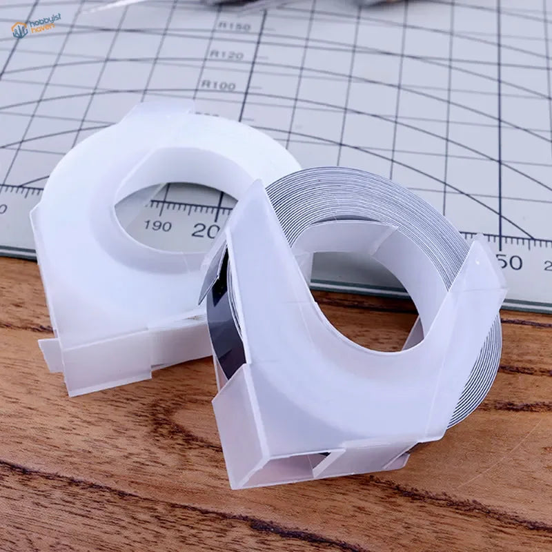 Hard-edge scribing tape dispenser with white plastic body and silver roll