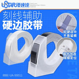 Hard-edge scribing tape dispenser with black tape roll, precision hobby tool