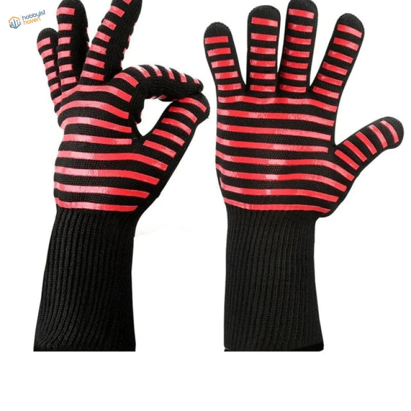 Red and black striped oven mitts with a textured grip on the fingers.